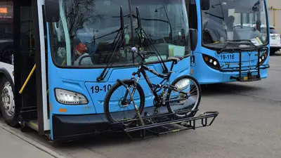 Bike loaded in front of bus